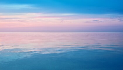 Obraz premium pastel sky and calm water with soft reflections pink and blue gradient horizon tranquil seascape scenery for adobe stock photo