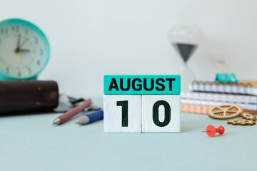 Wooden block calendar with the date August 10