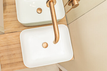 bathroom into a contemporary work of art. The combination of innovative shapes,
