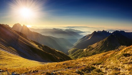 Obraz premium stunning mountain landscape with wildflowers and rolling hills at sunset