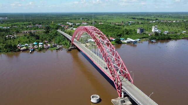 View from the top of the Rumpiang Bridge, located in South Kalimantan, Indonesia, as a link across the very wide Barito River