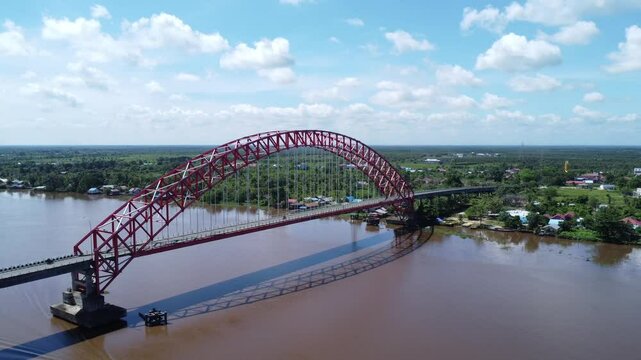 View from the top of the Rumpiang Bridge, located in South Kalimantan, Indonesia, as a link across the very wide Barito River
