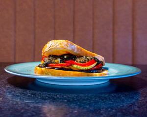 Delicious ratatouille sandwich on a plate, a perfect lunch or dinner option, full of fresh...