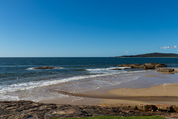 Beautiful view of ocean beach on a sunny day.