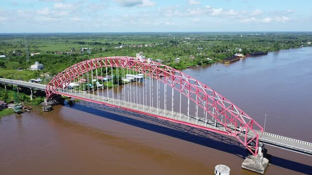 View from the top of the Rumpiang Bridge, located in South Kalimantan, Indonesia, as a link across the very wide Barito River