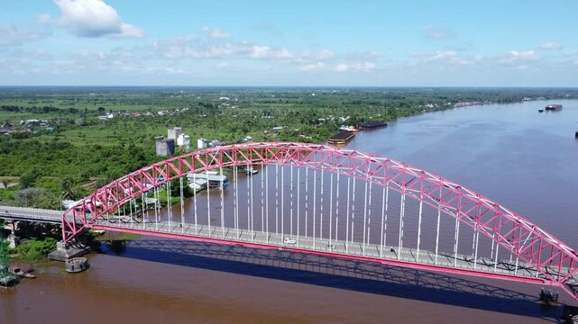 View from the top of the Rumpiang Bridge, located in South Kalimantan, Indonesia, as a link across the very wide Barito River