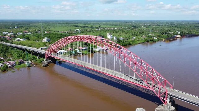 View from the top of the Rumpiang Bridge, located in South Kalimantan, Indonesia, as a link across the very wide Barito River