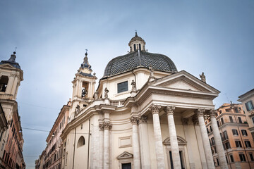 Chiesa Santa Maria dei Miracoli in rome dominates a narrow Roman street, its Baroque dome, twin bell towers and Corinthian portico rising. Church of saint mary of miracles is a catholic church.
