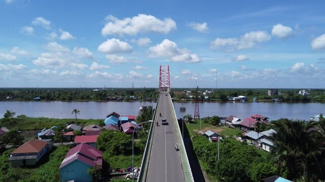 View from the top of the Rumpiang Bridge, located in South Kalimantan, Indonesia, as a link across the very wide Barito River