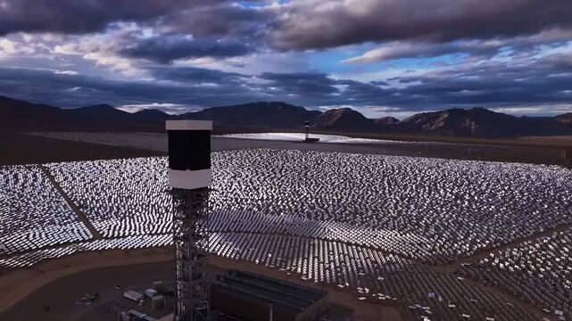 Aerial view of solar plant with mirrors at blue hour, United States.