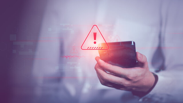 Programmer and virtual icons , exclamation mark ,alarm,computer virus detected ,danger warning concept or information error that should be urgently fixed and repaired ,Notification of security issues