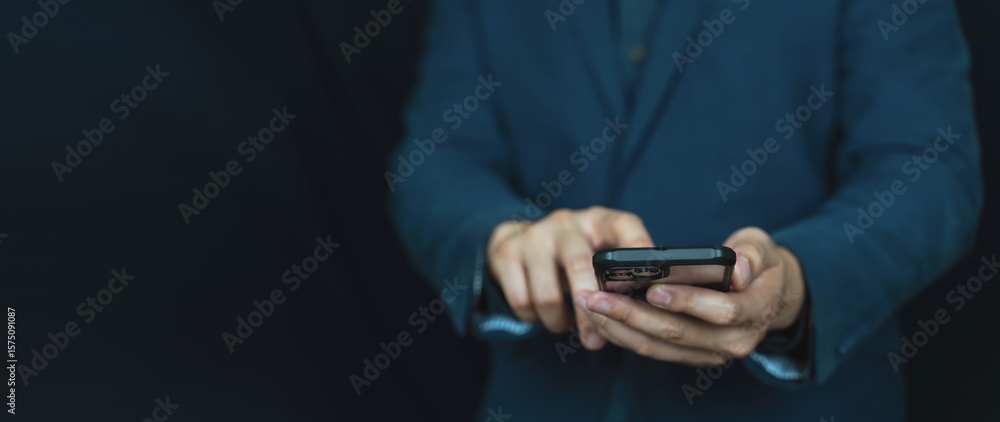 Poster businessman using smartphone with copy space for tech message