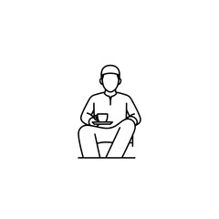 Person sitting and enjoying a cup of coffee in a relaxed setting