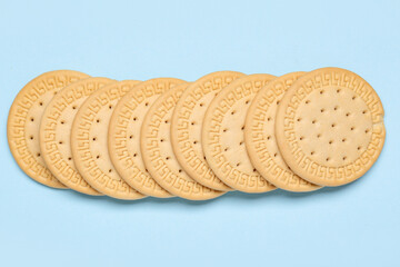 Many sweet cookies on blue background
