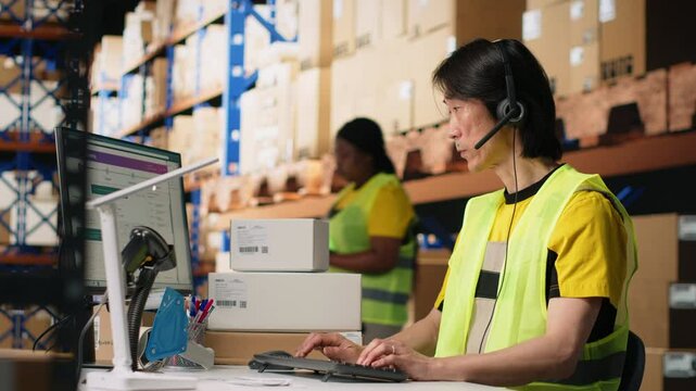 Call center employee assisting customers in a fulfillment center, handling inventory control and package tracking. Asian man resolving issues related to delivery delays or wrong addresses. Camera B.