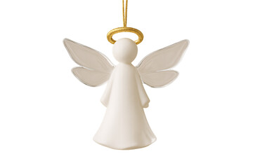Fototapeta premium Close up of a white angel ornament with a gold halo hanging on a black background in a studio shot