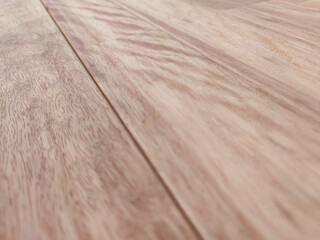 Close-up of wooden planks with natural grain texture used for flooring or furniture. Macro shot of...
