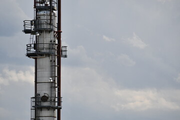 Large tower on oil refinery.