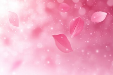 Soft pink flower petals gently floating in a dreamy sparkling light-filled background conveying calm and delicate beauty