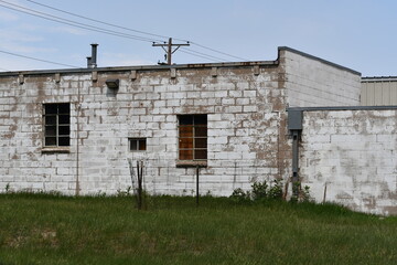 Abandoned brick building in industrial district.