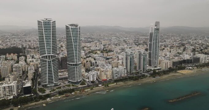 Aerial view of urban skyline and sea, Cyprus.