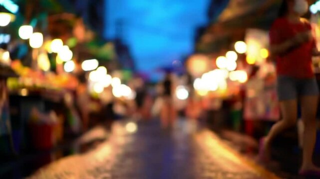 Rainy market stroll illuminated by glowing lights