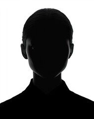 Silhouette of a person with neat hair pulled back against a bright white background creating a dark shadowed profile
