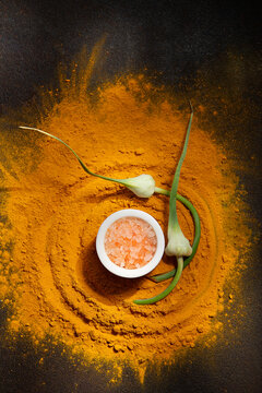 Turmeric, Himalayan salt, garlic flowers 