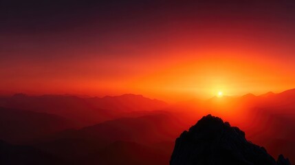 Fiery sunrise over a mountain range.