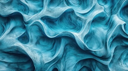 Close-up of smooth, flowing blue and white rock formations creating an abstract, wavy pattern with soft curves and textures