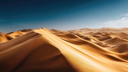Vast expanse of golden sand dunes under a vibrant sky.