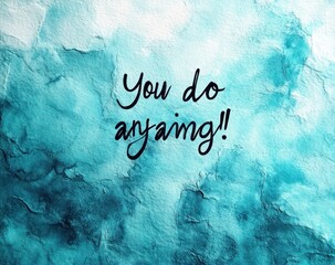 Motivational message with hand-lettered text on textured blue watercolor background conveying encouragement and positivity
