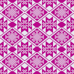 Seamless pixel geometric diamond pattern in pink and white, ethnic cross-stitch inspired textile