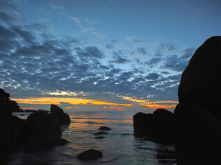 Sunrise at Teluk Cempedak, also known as Palm Beach, located in Kuantan, Malaysia