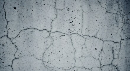 Fototapeta premium Cracked Concrete Texture: A close-up shot of a weathered concrete wall, showcasing a network of cracks and textures, conveying age and urban decay.