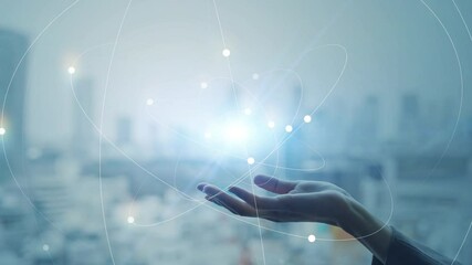 Hand operating a communication network with city background - Powered by Adobe