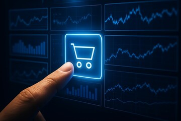 Human finger touching glowing shopping cart icon screen