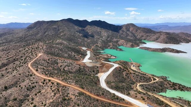 Aerial view of copper mine and mountains, United States.