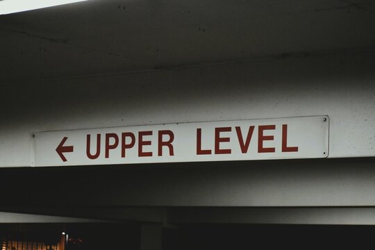 Parking Garge Sign Pointing to Upper Level