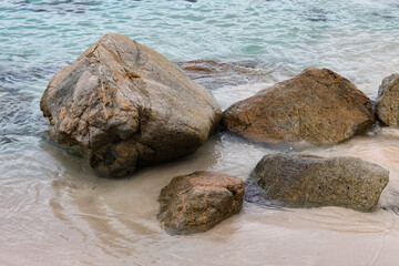 Granite rocks on the Wineglass Bay Beach - Freycinet Peninsula, Tasmania, Australia