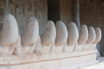 Impressive stucco façade and entrance to the tomb of Ukit  Kan Lek Tok through the jaws of a...