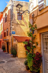 Rustic Chania, Crete Street Corner with Plants and Colorful Walls