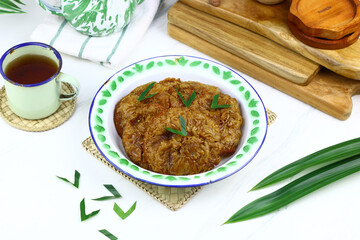 Kue Cucur, Indonesian traditional cake, made from rice floor, palm sugar. Popular street food in...