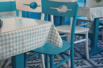 Charming cafe seating arrangement with blue accents