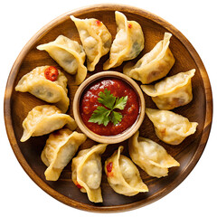 Dumpling momos with sauce in a wooden plate top view isolated on transparent white background, clipping path