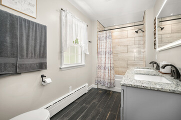 Spa-Inspired Bathroom with Elegant Fixtures and Soft Lighting