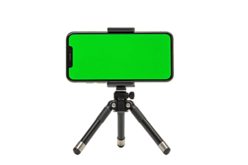 Mobile phone with green screen on a small tripod.