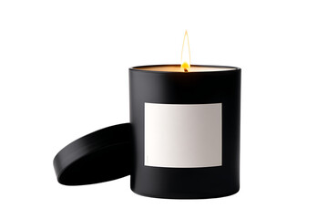 Lit black candle with blank label, isolated on black background.