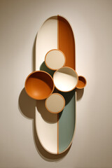 Abstract Wall Decor: Earth Tones and Asymmetrical Circle Shapes on a Modern Art Piece