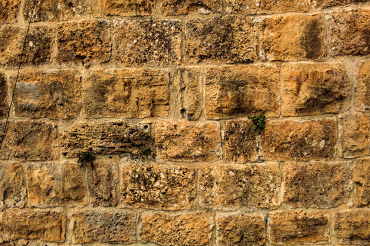 The surface of a wall built with ashlar stones